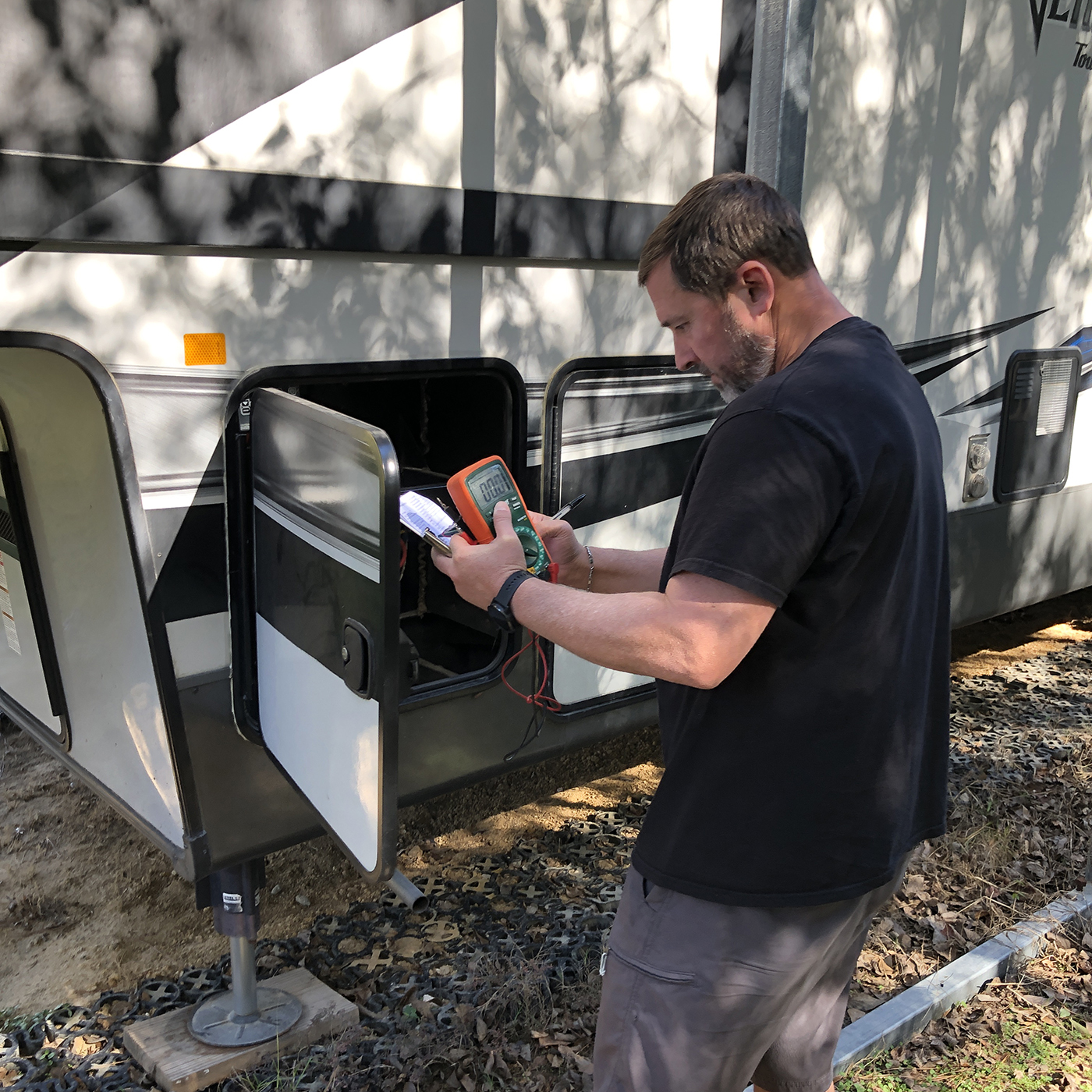 One of our experienced RV Inspectors, Clint Hall, preforming an inspection or a recreation vehicle